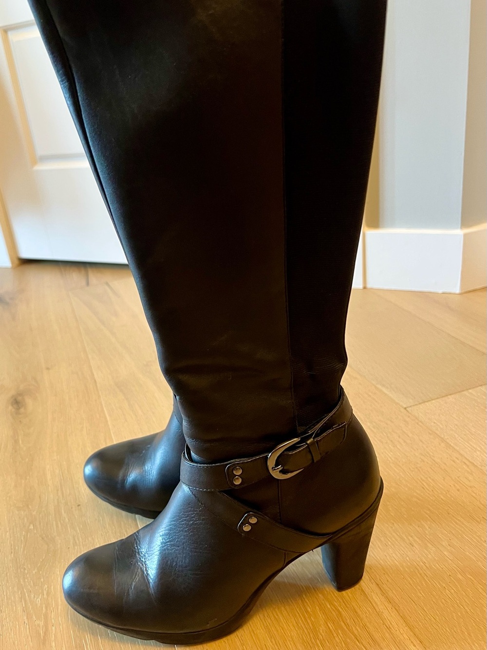 Blondo Black Knee-High Heeled Boots with Buckle Accent